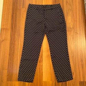 Great pants! Only wore it twice. Pretty much new. Material has a satin feel.